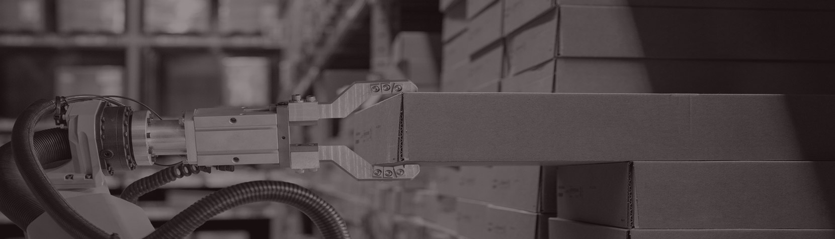 robot arm pulling box off shelf
