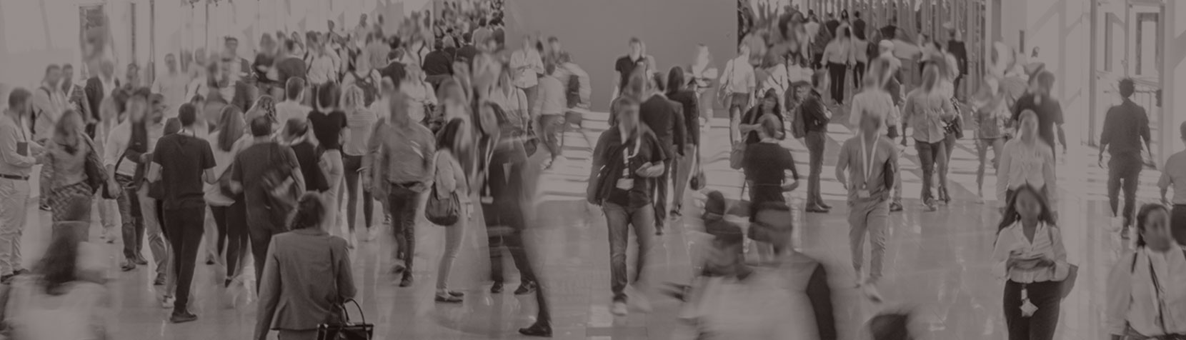 attendees walking around trade show